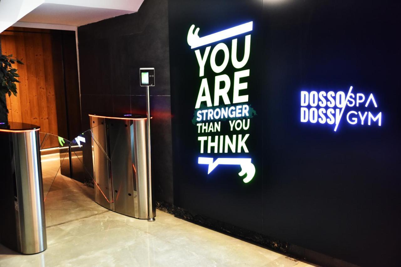 ดอสโซ่ ดอสซี่ โฮเต็ล แอน์ สปา ดาวน์ทาวน์ Hotel อิสตันบูล ภายนอก รูปภาพ The photo shows an entrance area with a modern design, featuring a wall with motivational text that reads "YOU ARE STRONGER THAN YOU THINK." This text is visually striking and designed to encourage individuals. On the adjacent wall, there is a sign t